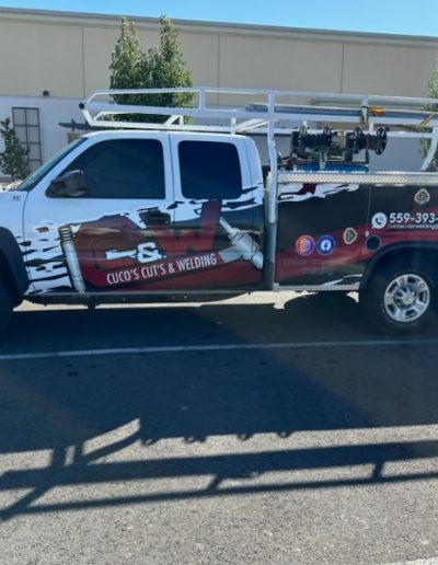 Mobile Welding - Durable wrought iron gate with an arched top and decorative scrolls, offering both style and protection