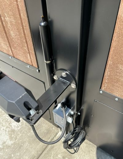 High-quality black metal double gate with decorative accents, enhancing the aesthetic appeal of the home